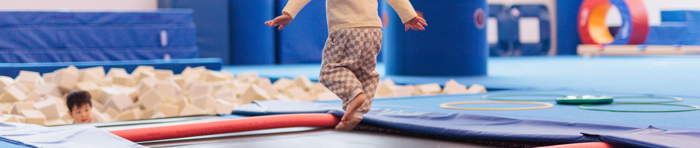 Kid at gymnastics