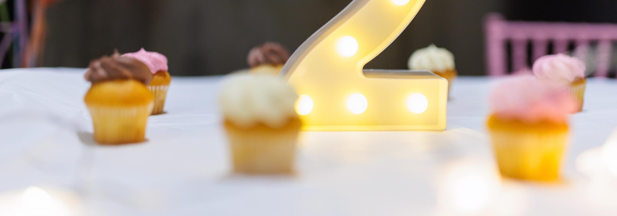 cropped version of cupcakes surrounding number 2
