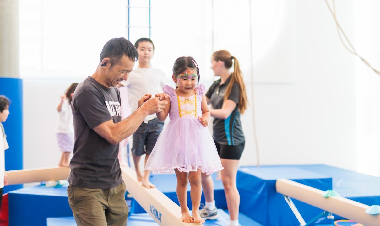 Child doing gymnastics