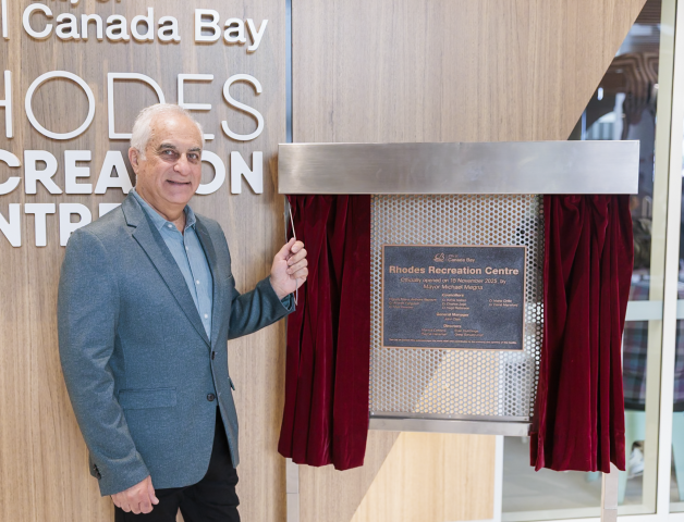 Mayor Megna with Rhodes Rec plaque